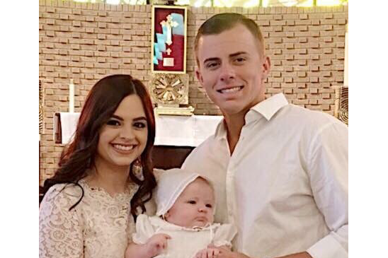 Travis Sholar with his wife, Brooke, and daughter, Blakely